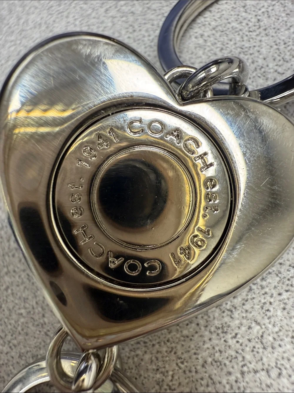 COACH Blue Heart Turnlock Keychain with Silver Hardware